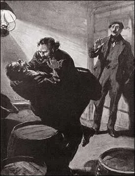 HE HURLED HIM ACROSS ONE OF THE BARRELS